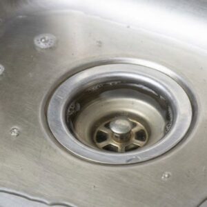 slow draining kitchen sink